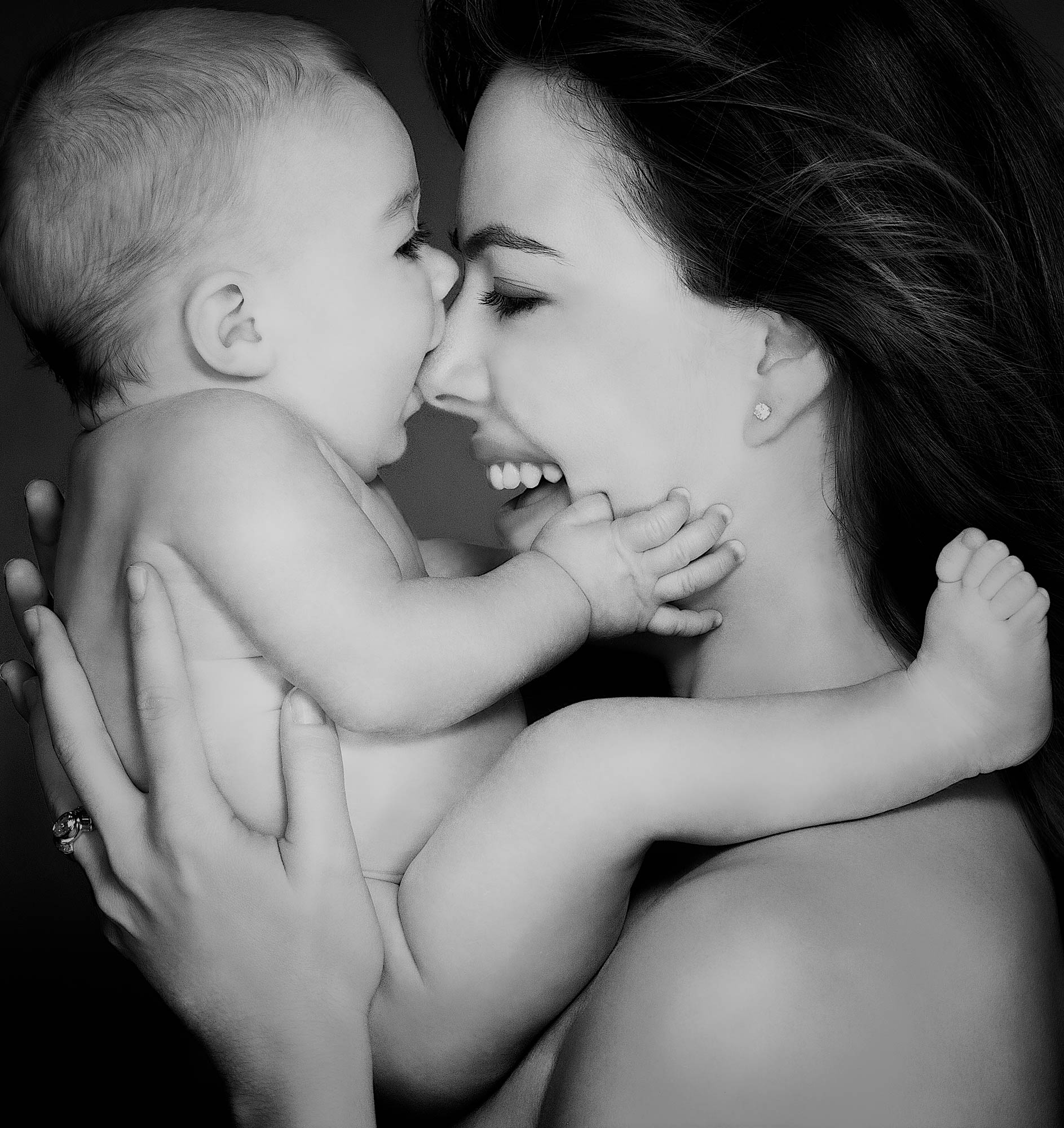 Portrait of Gina Tolleson Thicke with her son Carter Thicke by Benoit Malphettes.  Gina  is an American model and beauty queen who was crowned Miss World America 1990 and also Miss World 1990